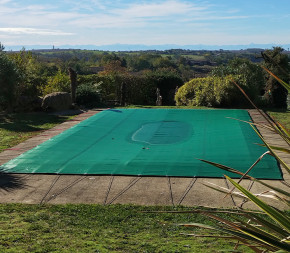 Bache de protection pour piscine enterrée 6x10 metres avec filet d